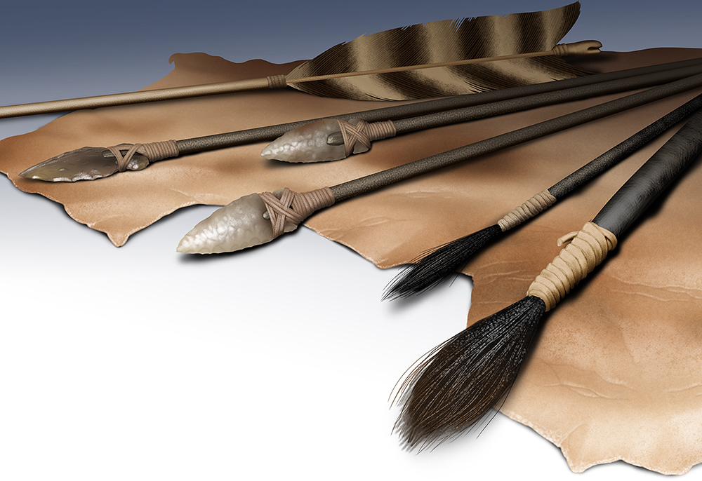 Primitive flint-tipped arrows and similarly constructed paint brushes laid out on a leathery animal hide.